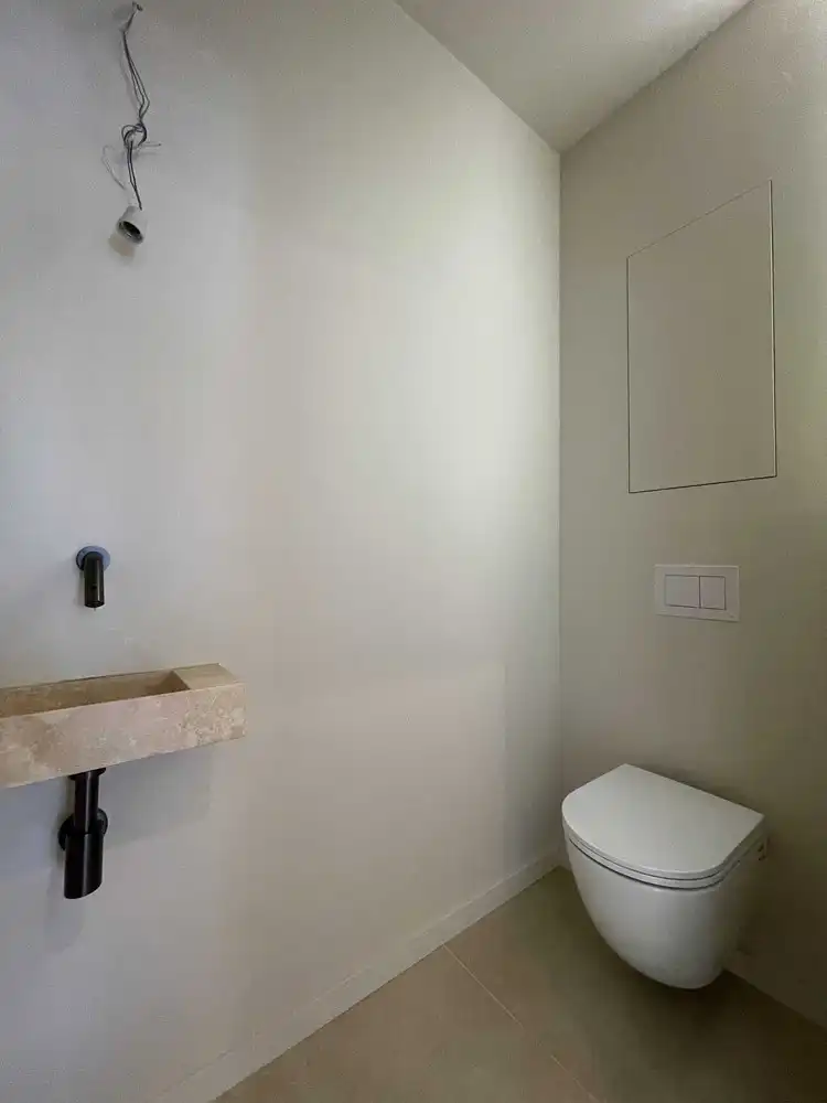 Smaakvol gerenoveerde woning met stadstuin foto 16