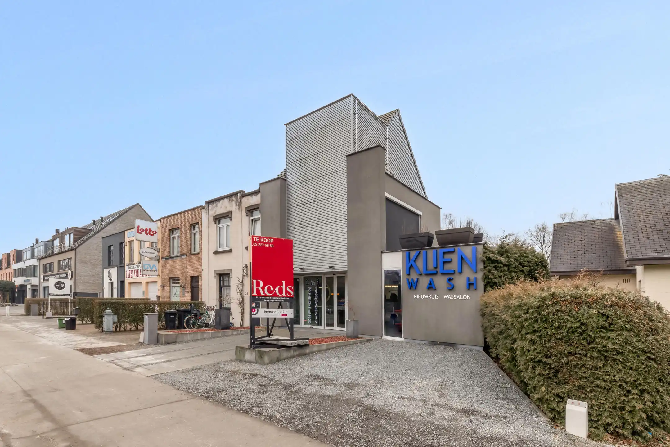 Modern gebouw met handelsgelijksvloers + duplex 1slpk app. foto 25