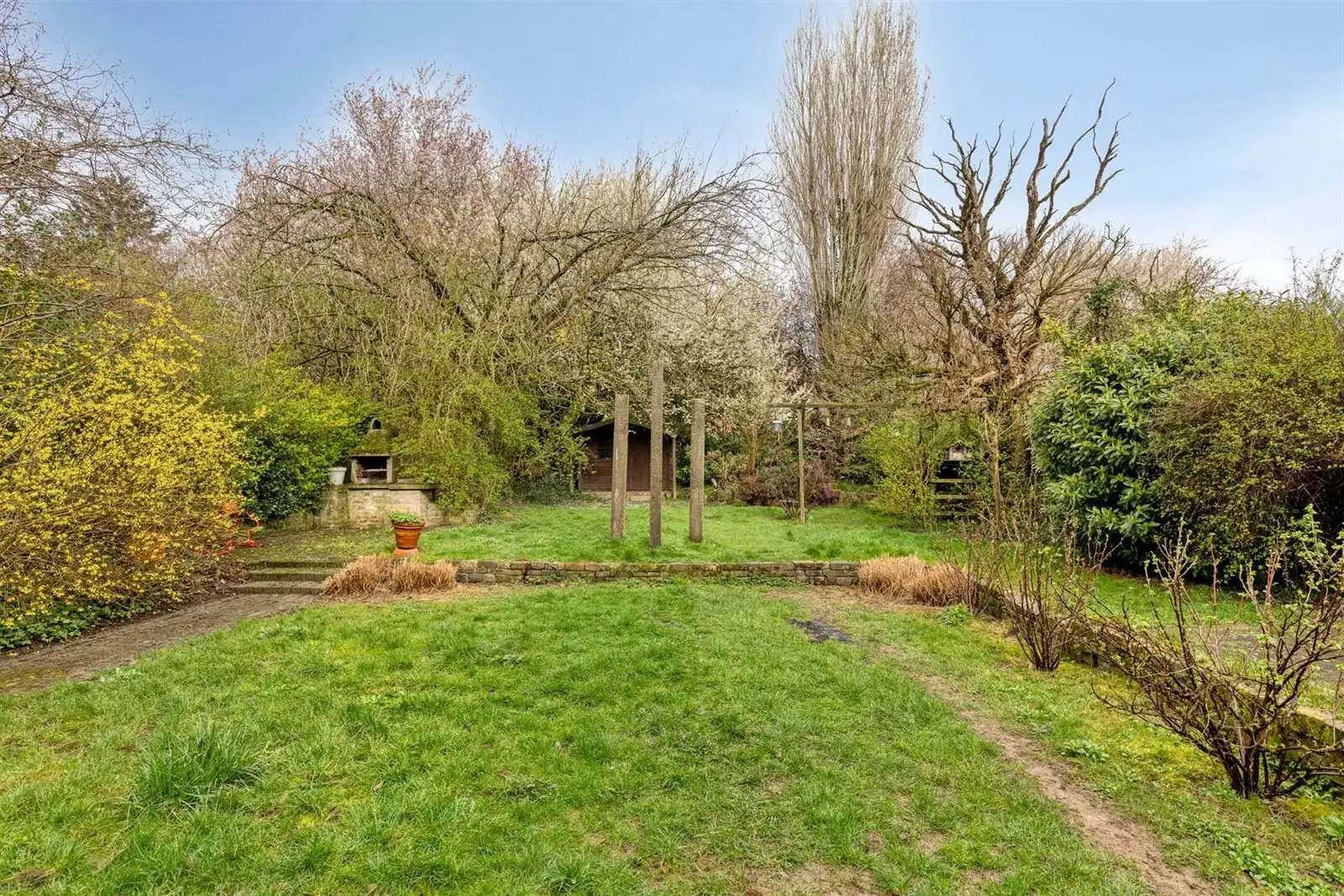 Gelijkvloers appartement (159m²) met prachtige tuin foto 21