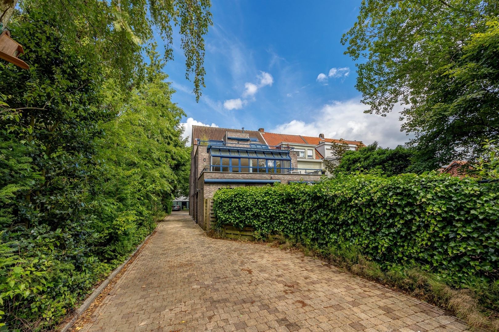 Licht dakappartement met 1 slpk, reuze zonneterras en garage foto 24