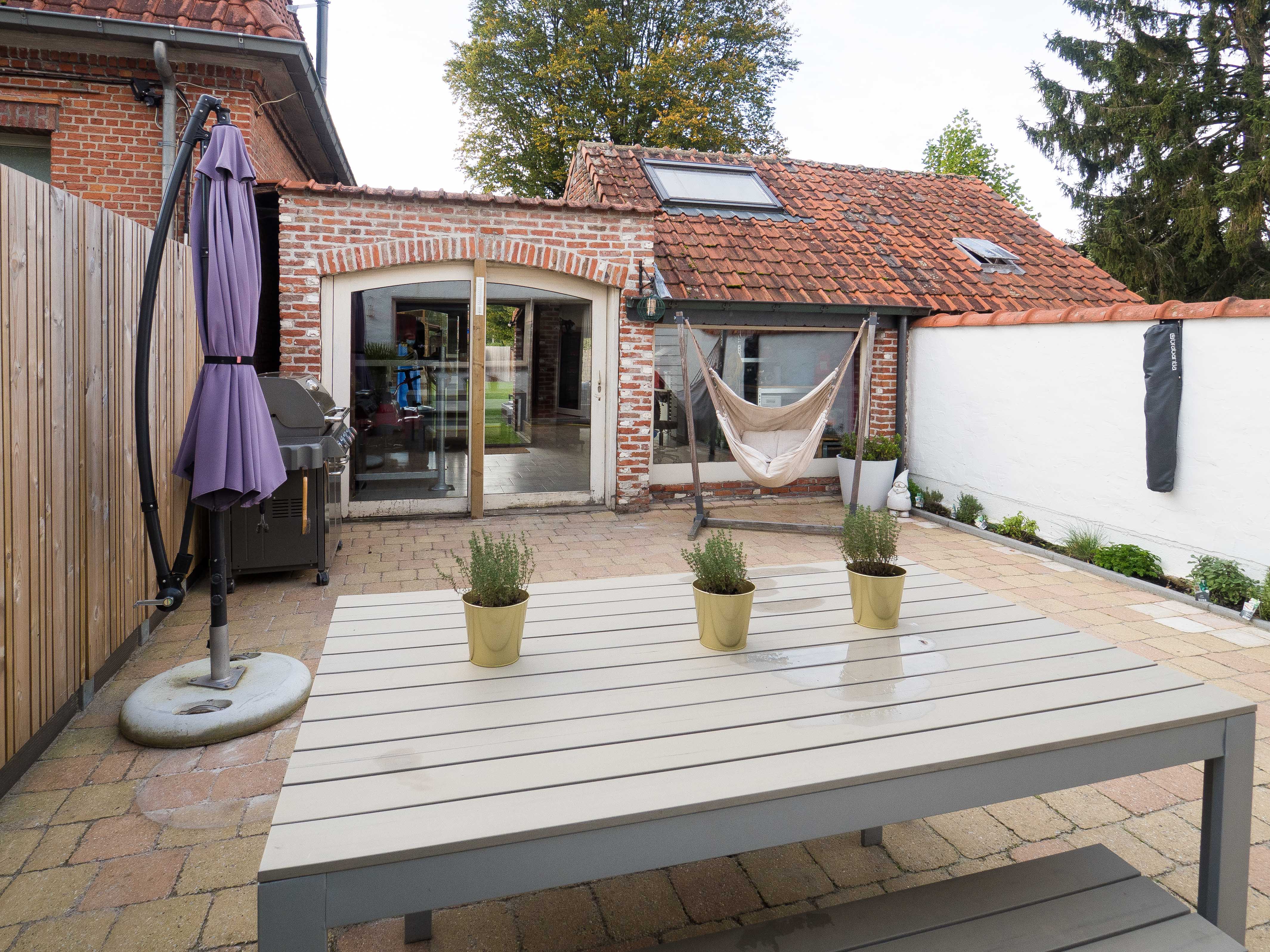 Sfeervolle gezinswoning met zonnige tuin in Mortsel foto 17