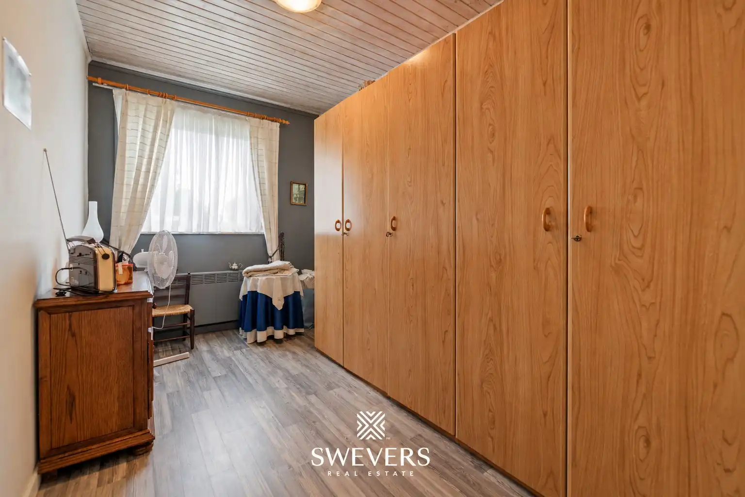 Karaktervolle gelijkvloerse woning met 3 slaapkamers, veranda en tuin in Heusden-Zolder foto 17