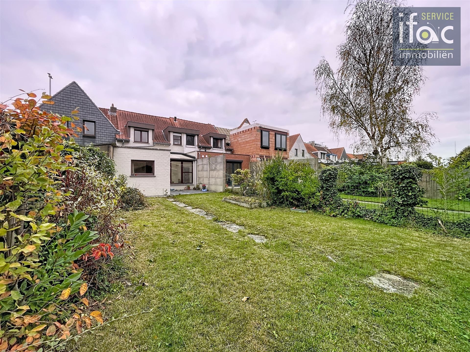 Rijwoning met tuin  foto 20