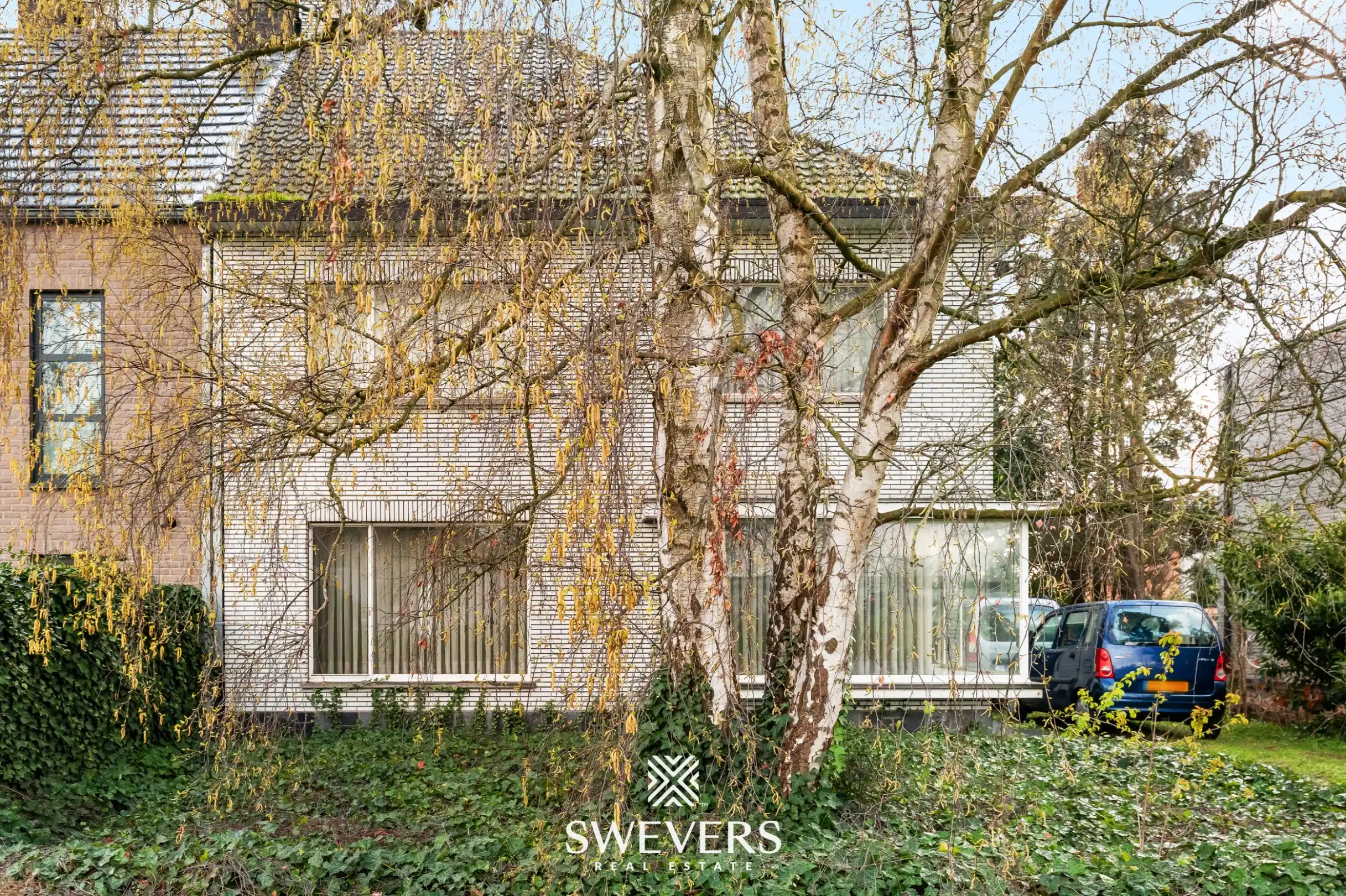 Ruime halfopen bebouwing met 4 slaapkamers en veel renovatiepotentieel op topligging in Hasselt foto 28