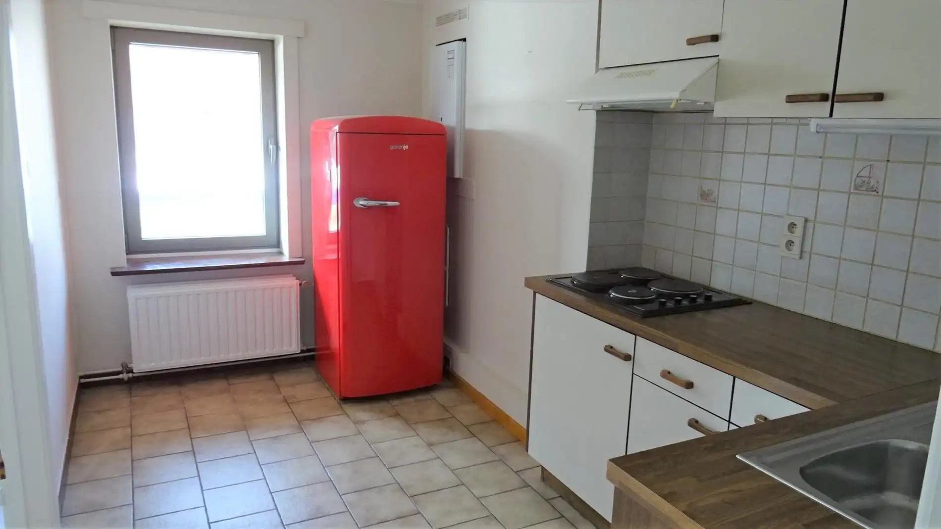 Goed gelegen, opgefrist appartement met 1 slpk en 2 kelders foto 4