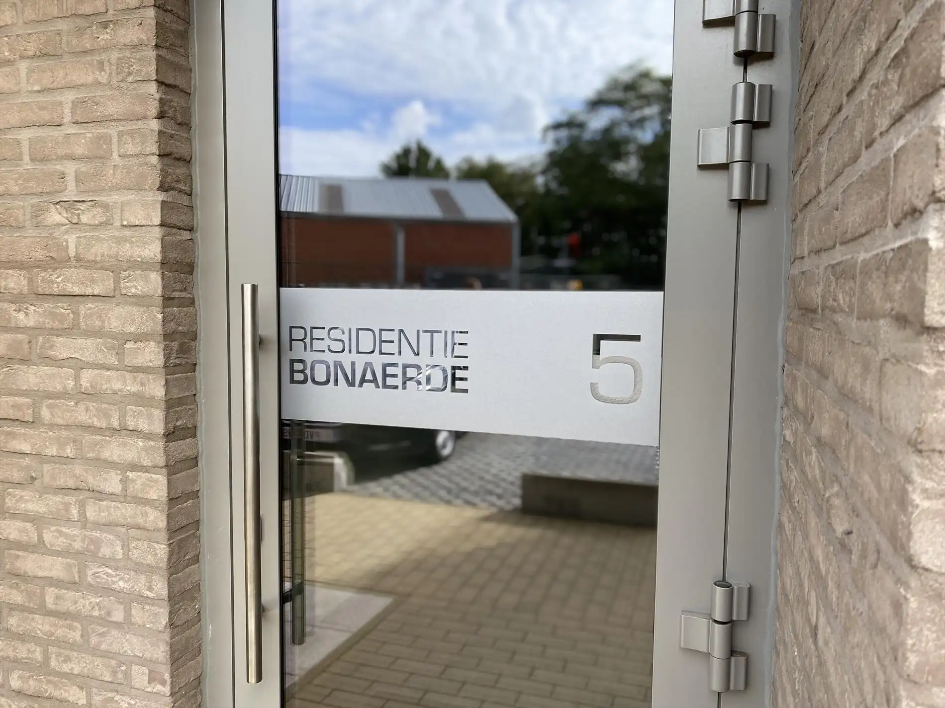 Ontdek dit prachtig gelijkvloers appartement met tuin en zicht op de Leie te Harelbeke! foto 12