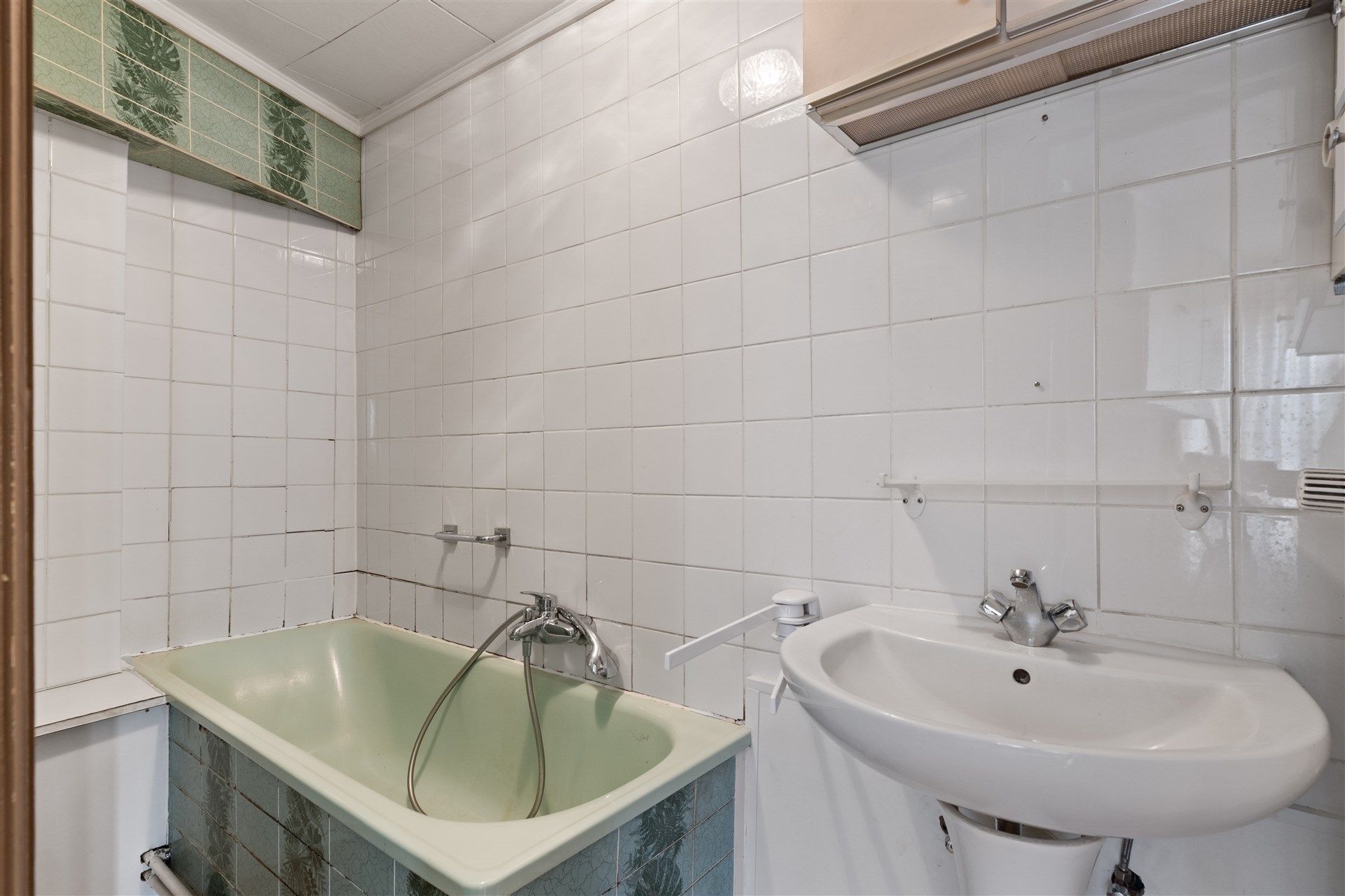 op te knappen woning met leuke tuin en inpandige garage. foto 9