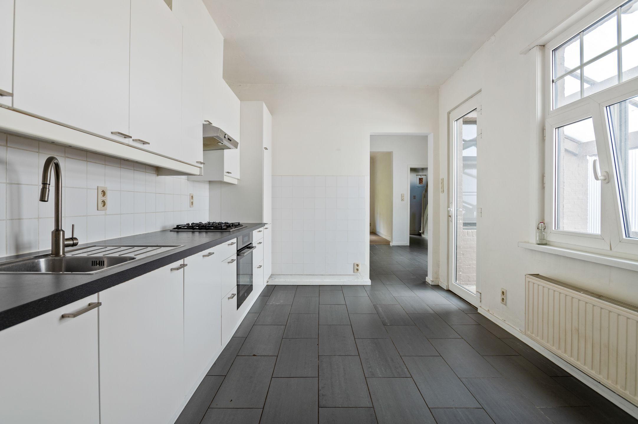 Halfopen woning met 2 slaapkamers en een grote tuin in Brasschaat te huur! foto 7