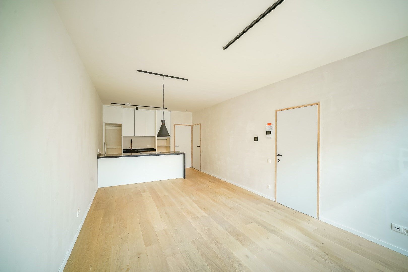 Nieuw 1-slaapkamerappartement met parking! foto 2