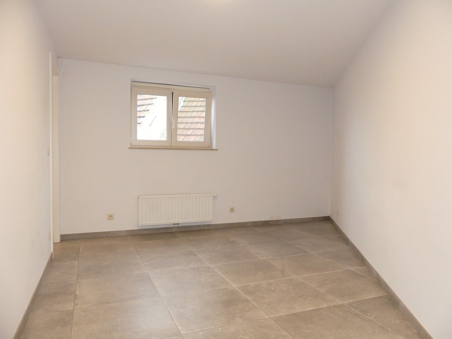 Halfopen nieuwbouwwoning met binnenterras, tuintje en garage - 3 slaapkamers foto 10