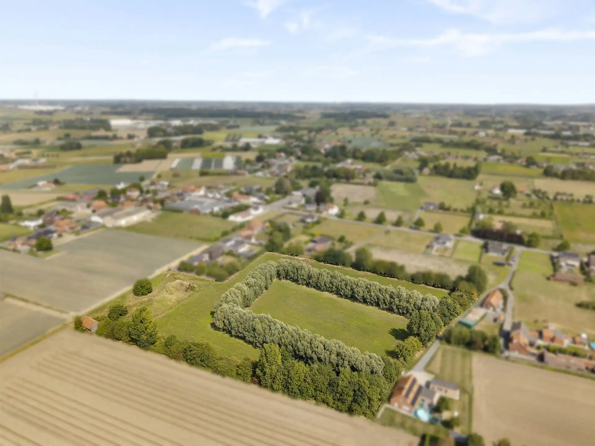 Unieke bouwgrond van 3300m2 + 2 hectare omheinde weide/tuin foto 3