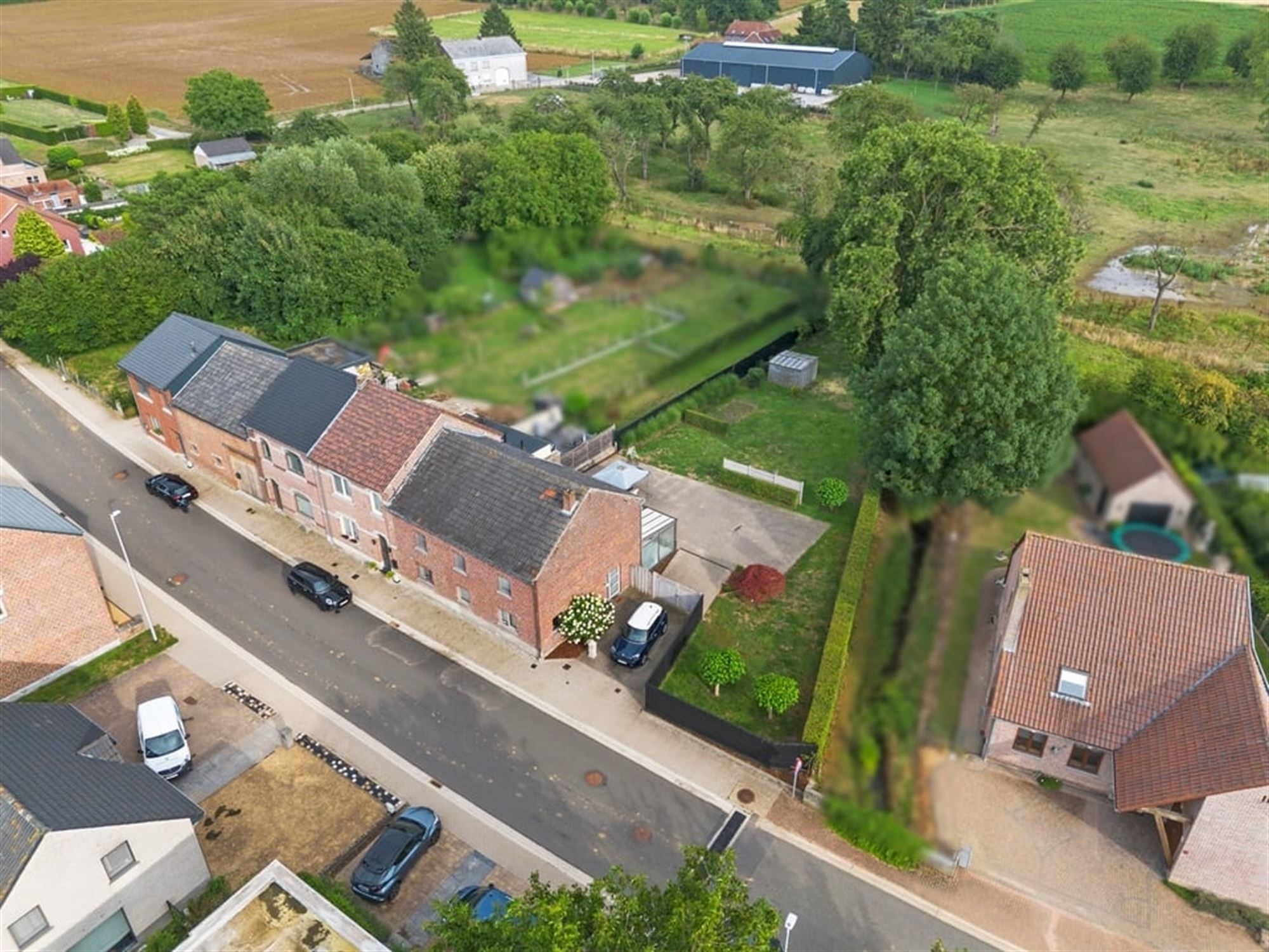 CHARMANTE GEZINSWONING OP EEN RUIM PERCEEL IN BUVINGEN foto 33