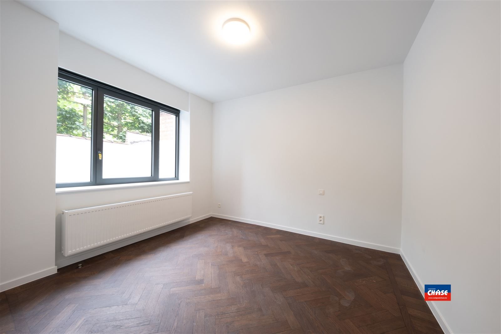 Gerenoveerd gelijkvloersappartement met één slaapkamer en stadstuin foto 10