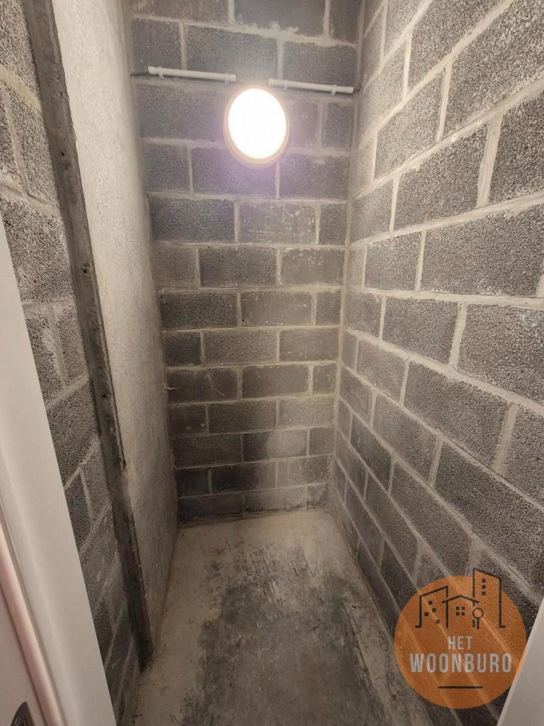 Gelijkvloersappartement met tuin, kelder en parkeerplaats foto 14