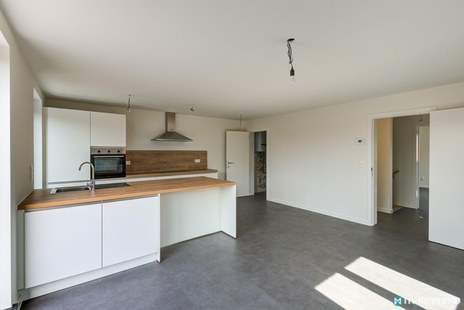 INSTAPKLAAR DUPLEXAPPARTEMENT MET 2 SLAAPKAMERS EN CARPORT IN MOPERTINGEN (BILZEN) foto 5