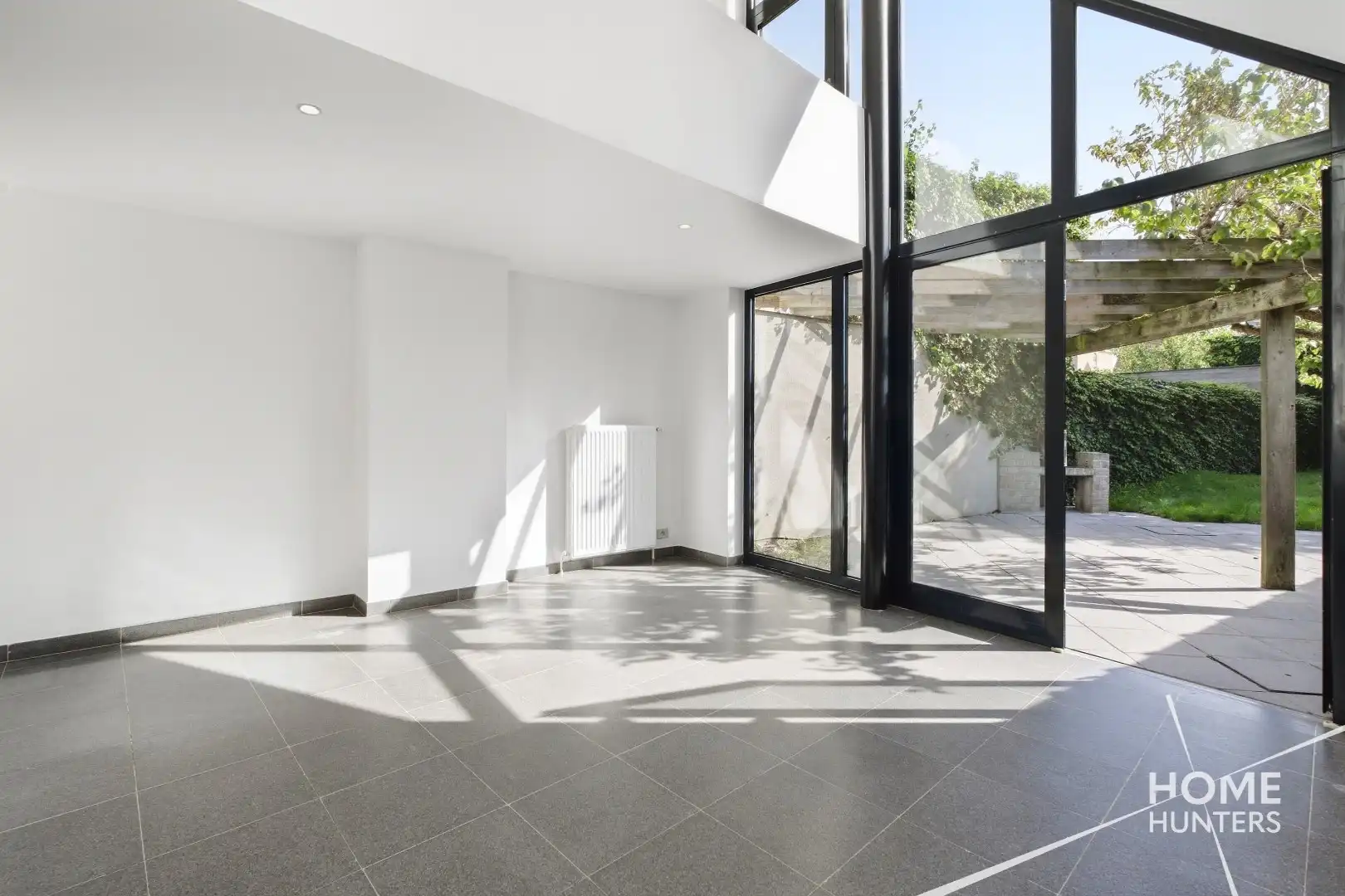 Ruime instapklare stadswoning met 3 slpks, tuin en EPC B foto 12