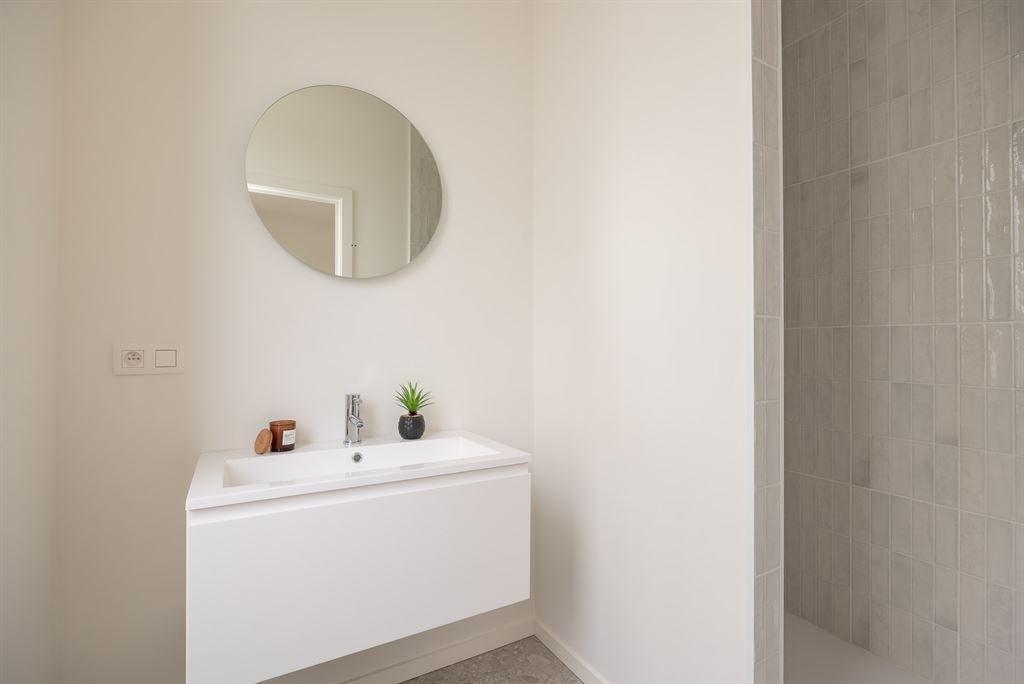 lichtrijk nieuwbouwappartement met terras foto 12