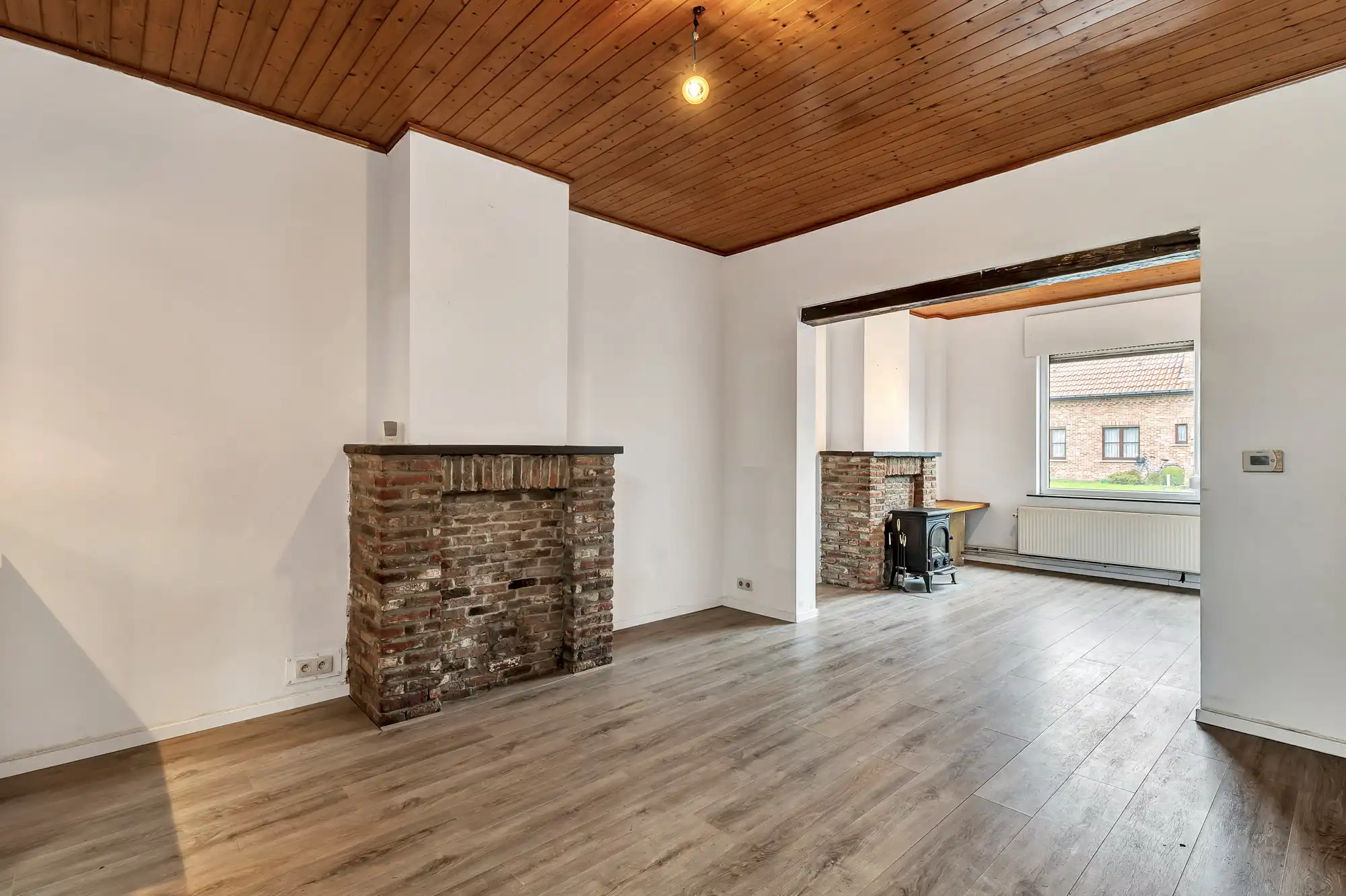 Gezellige rijwoning met tuin en achteruitweg foto 3