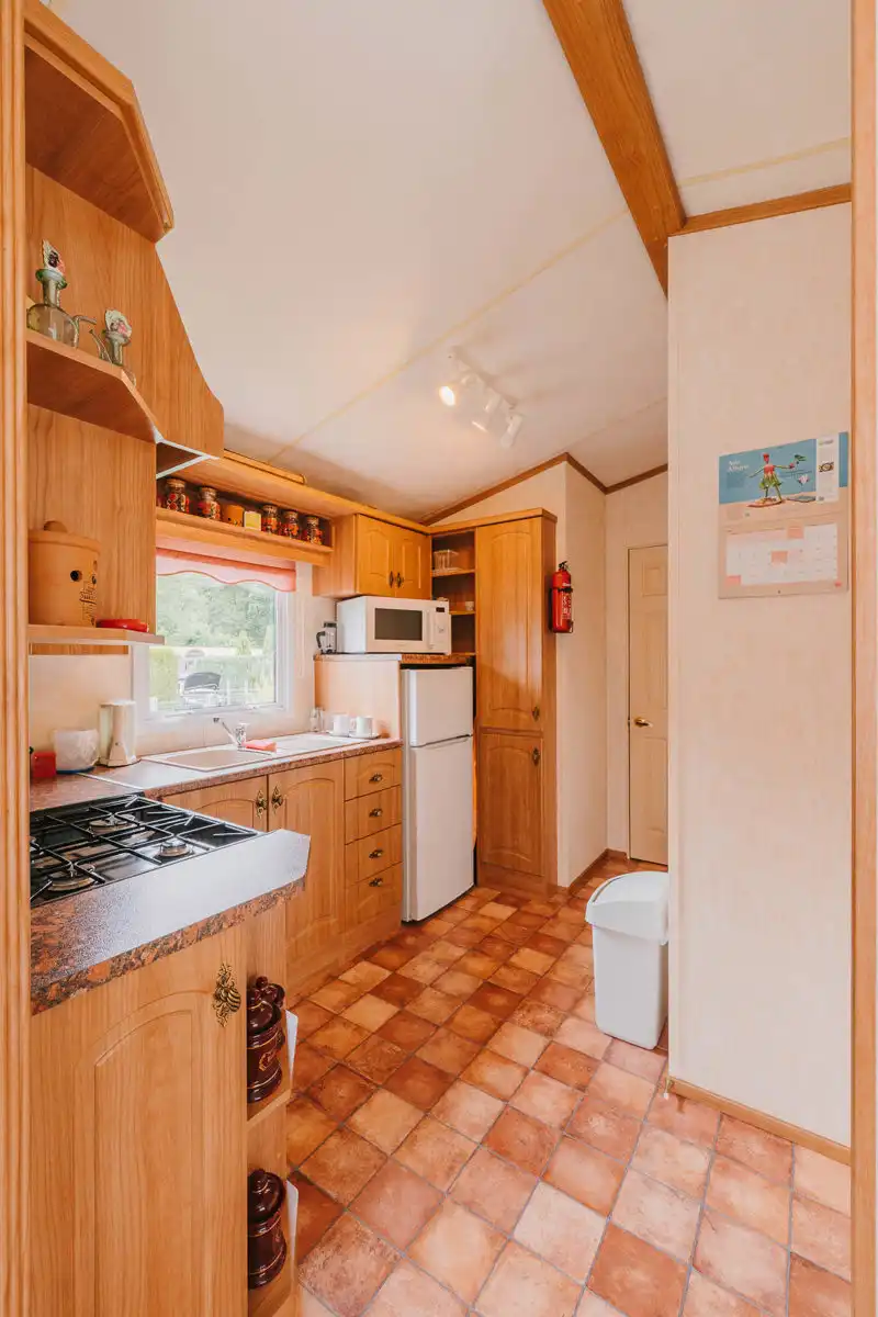 Prachtige agrarische tuin met caravan foto 9