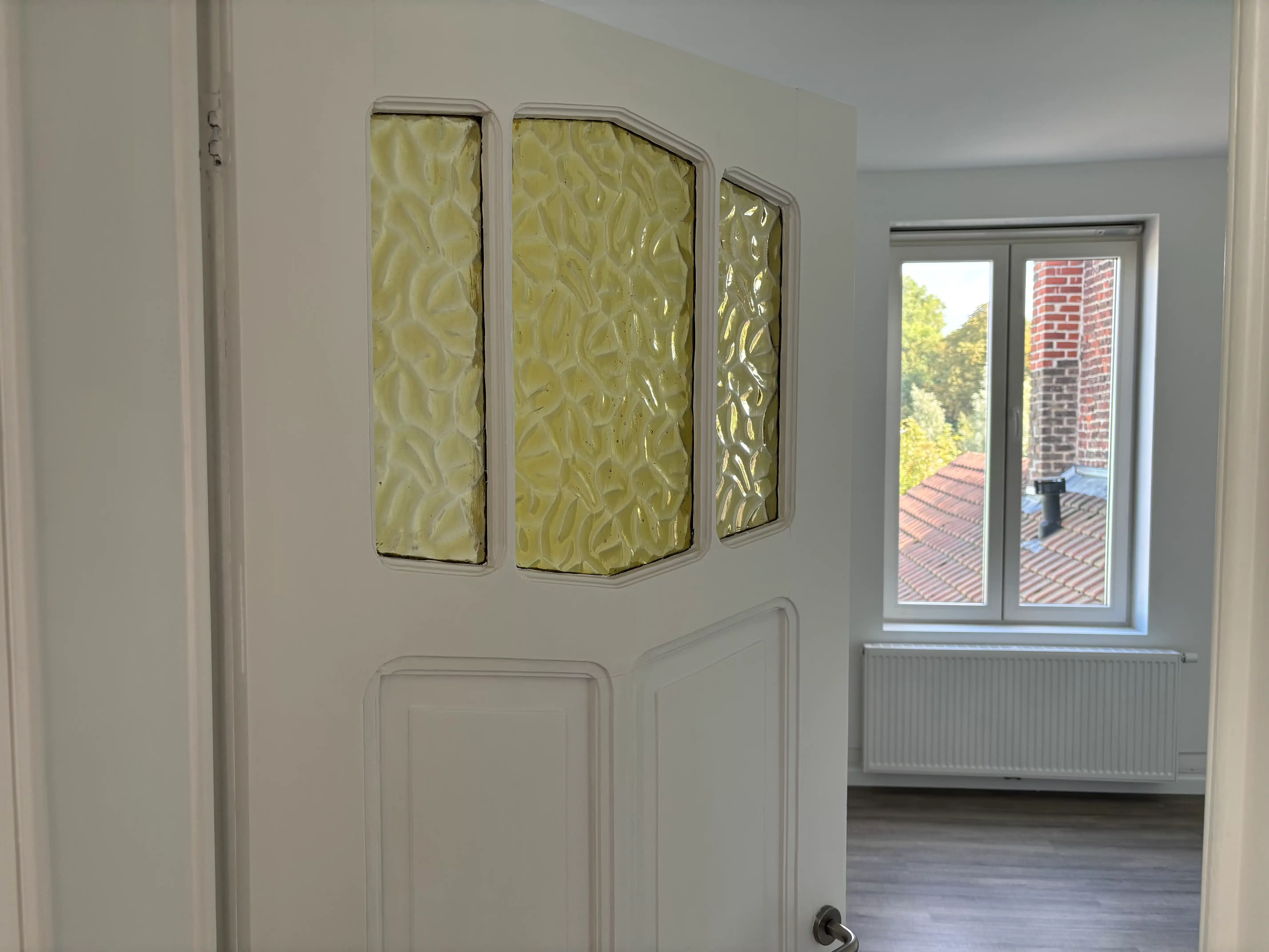 Gezellige rijwoning 4 slaapkamers + garage en stadstuin foto 12