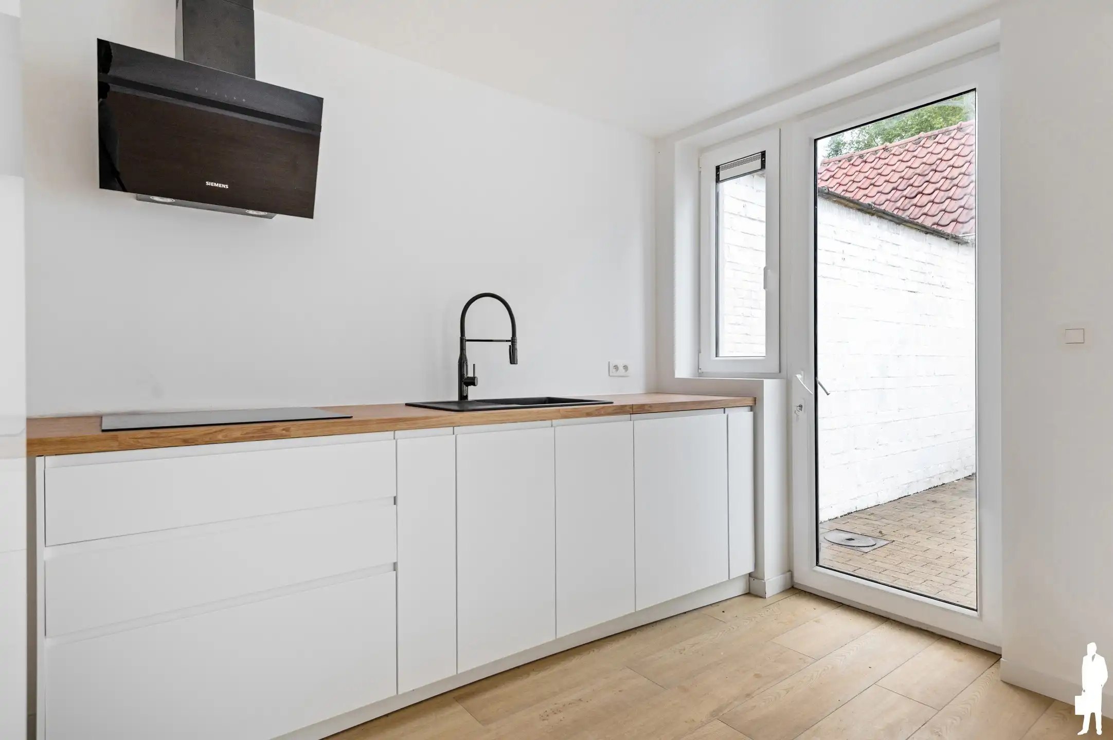 Instapklare gerenoveerde gezinswoning met 3 slaapkamers en diepe tuin nabij het centrum van Kalmthout foto 4