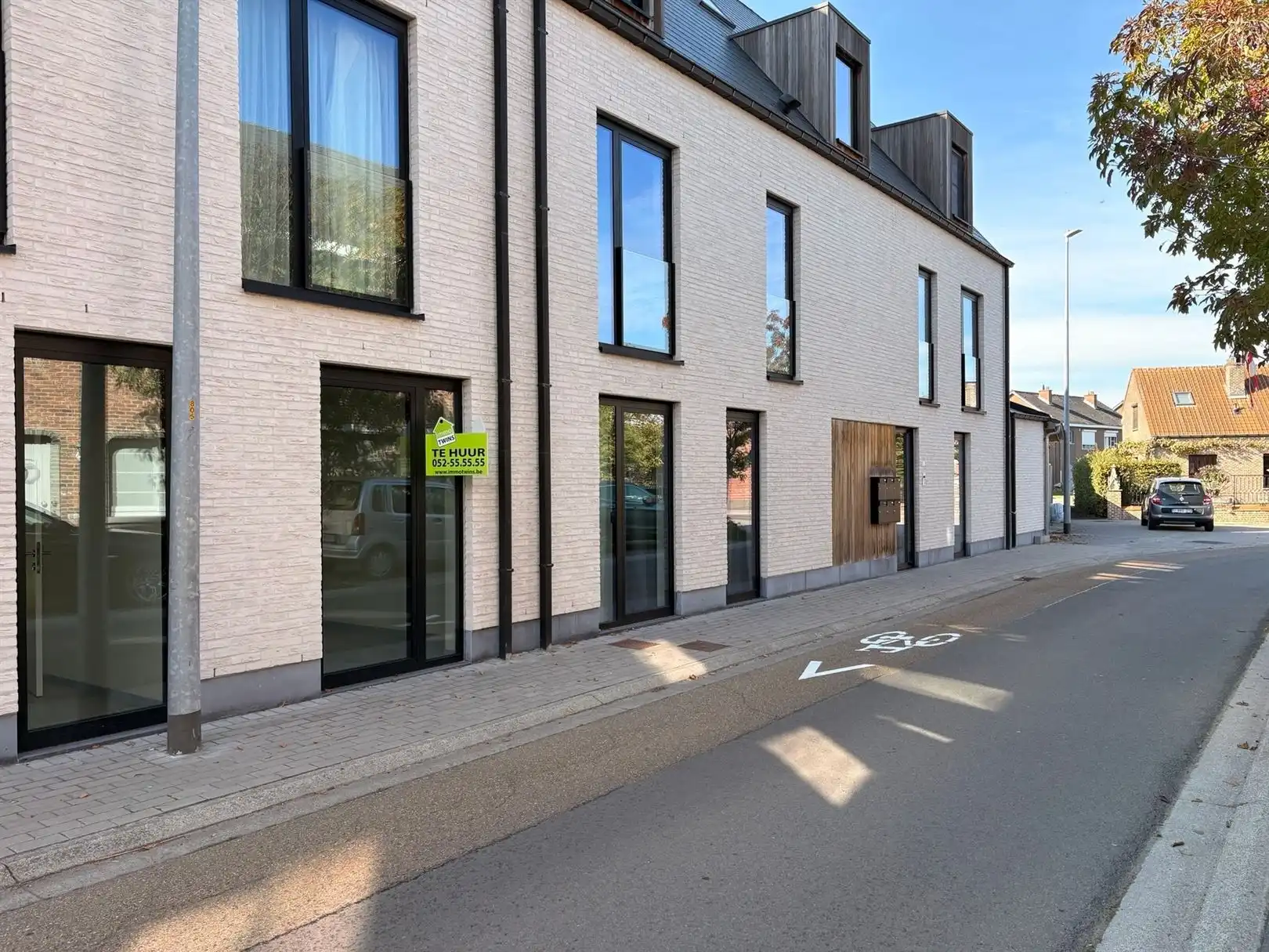 Modern en instapklaar gelijkvloers appartement met terras, tuin en ondergrondse staanplaats in Grembergen foto 17