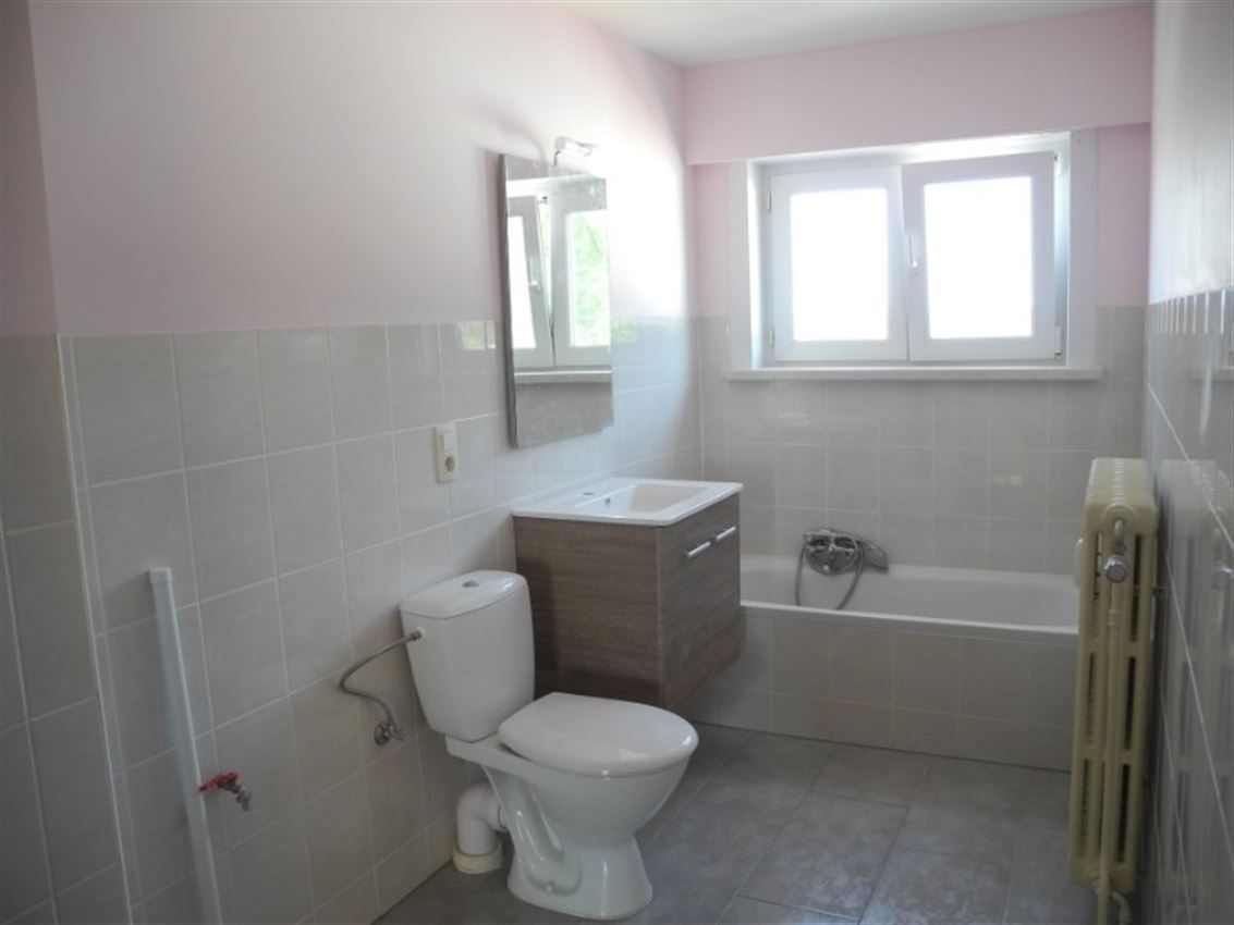 Opbrengsteigendom (handel & 4 app) op toplocatie foto 35