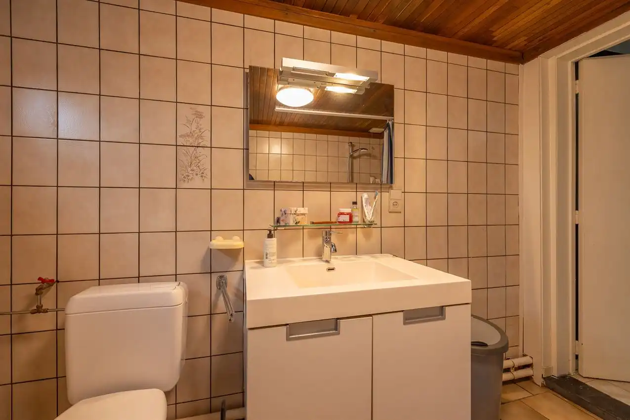 Opgefriiste woning 3slk op goed bereikbare ligging en zuidtuin foto 10