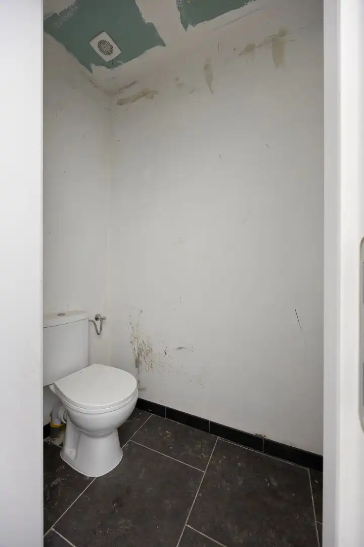 Commercieel gelegen handelspand met appartement met 3 slaapkamers en leuke stadstuin ! foto 14