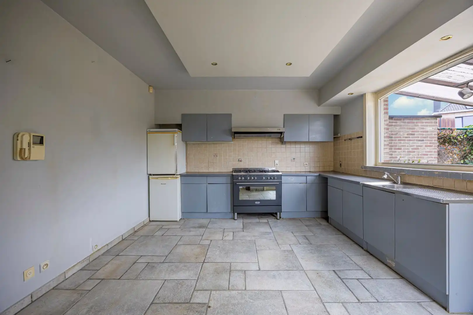 Mooie eigendom op 446 m² met goede locatie - 3 slaapkamers, garage, tuin foto 9
