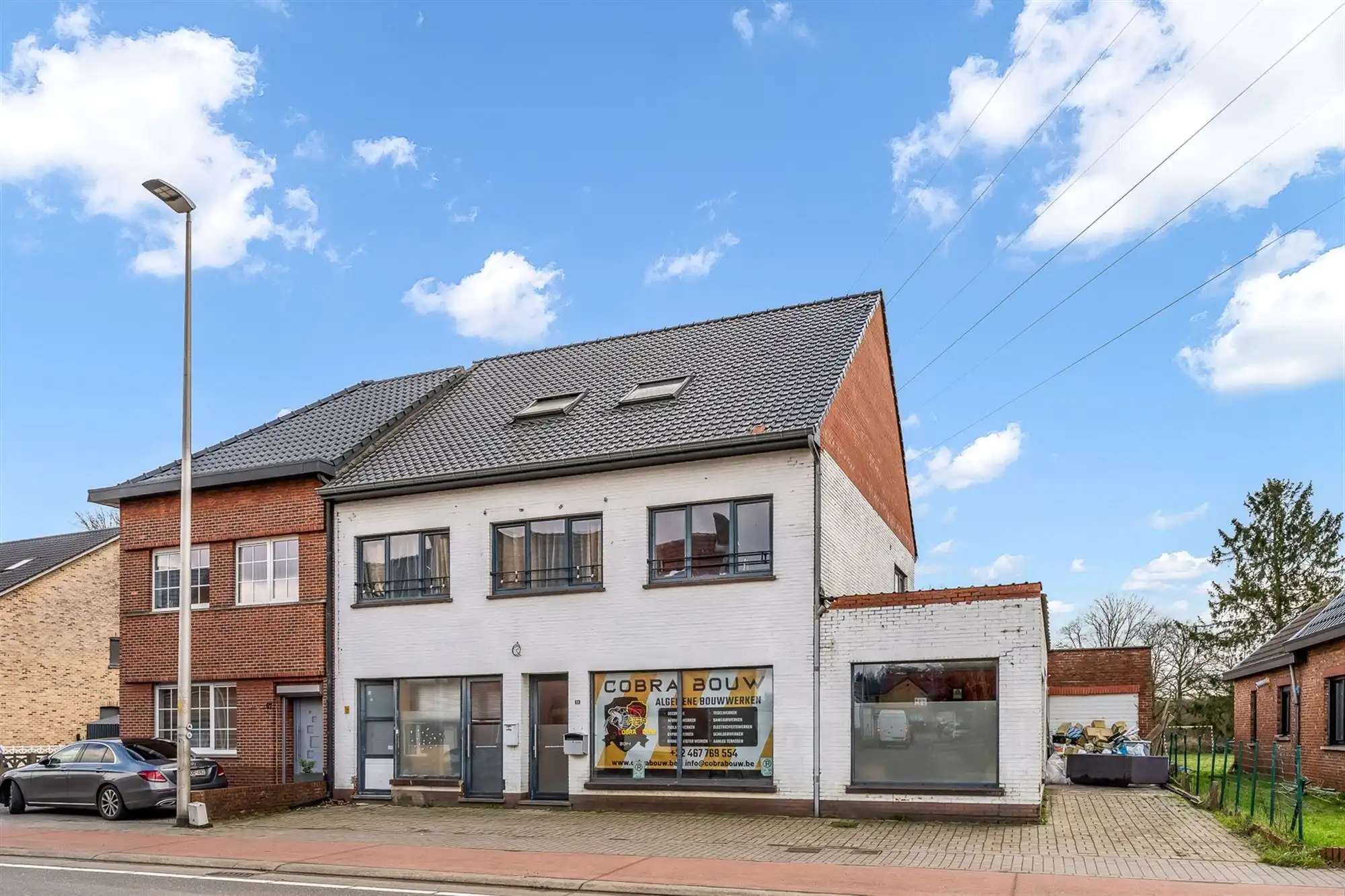 HANDELSHUIS MET RUIM HANDELSPAND EN 2 WOONENTITEITEN OP PERCEEL VAN 9A68CA TE KOERSEL foto 49