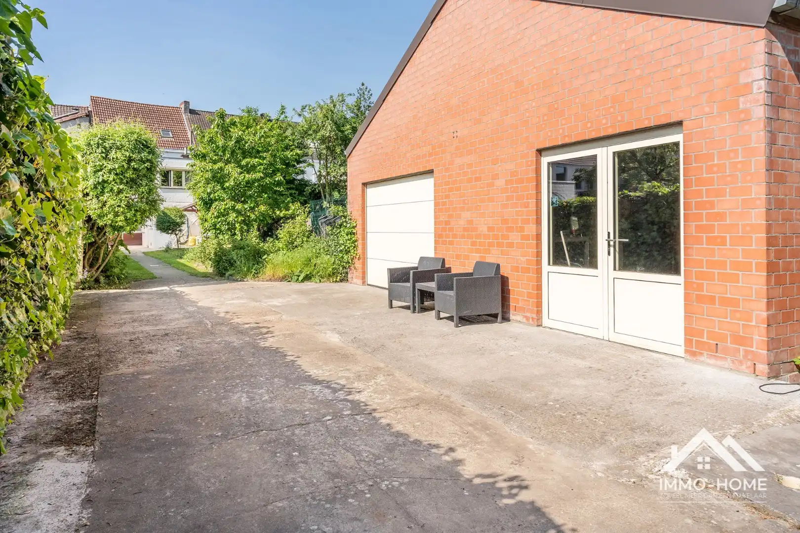 Instapklare woning met polyvalente ruimte en vrijstaande garage!  foto 4