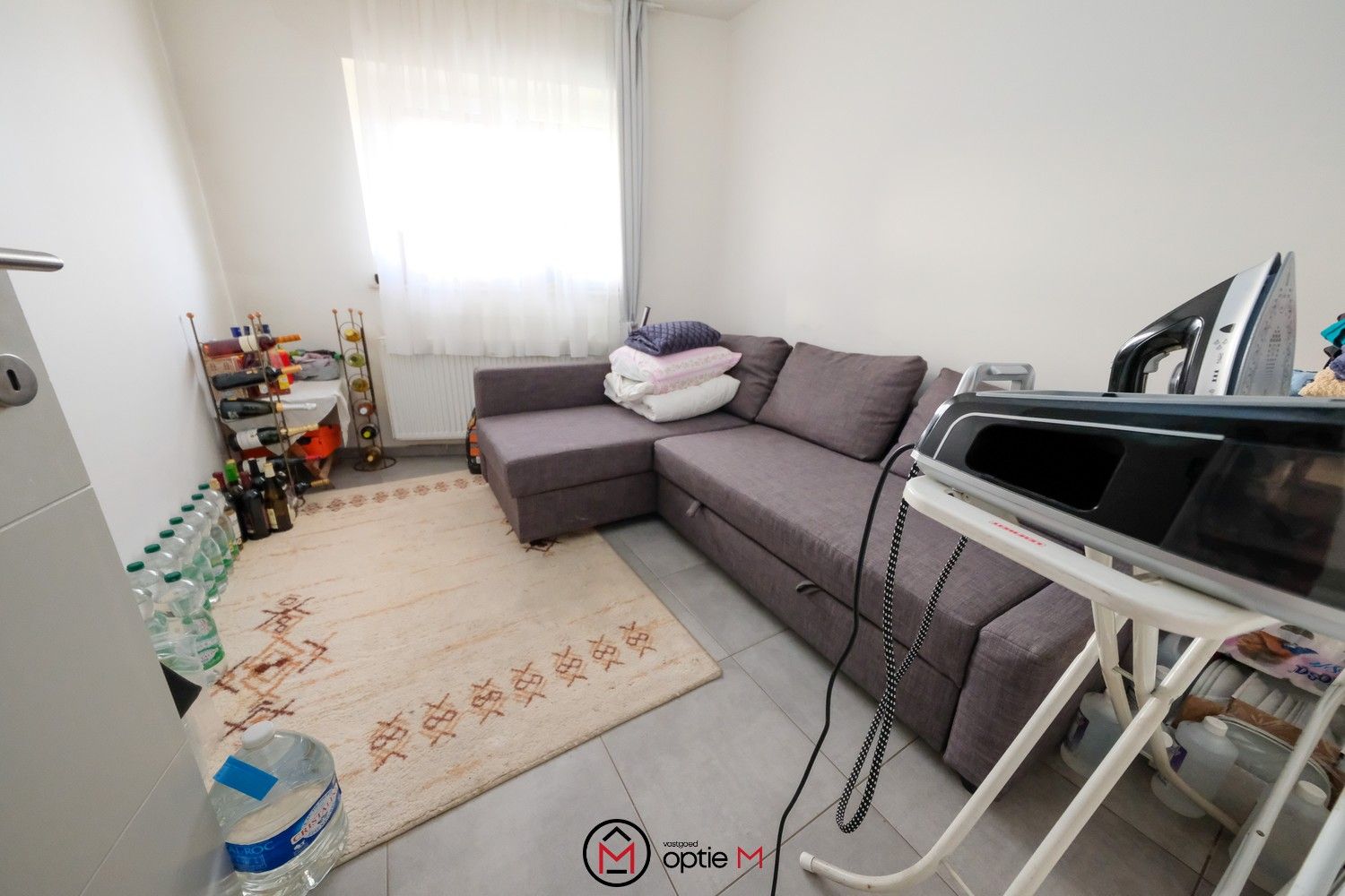 Centraal gelegen appartement met 2 slpks, terras en tuin foto 11