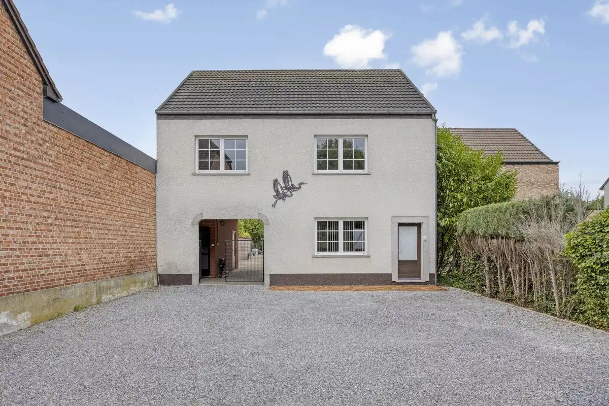 OPBRENGSTEIGENDOM BESTAANDE UIT TWEE RUIME EN VERHUURDE APPARTEMENTEN IN HERK-DE-STAD foto 9