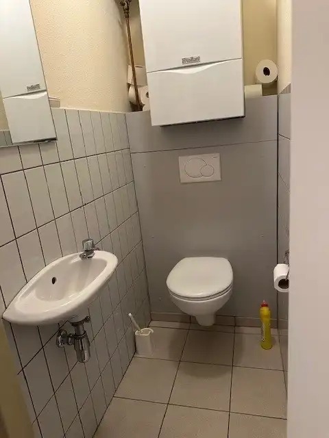 Ruim appartement met prachtig zicht op het marktplein in hartje Neerpelt! foto 16