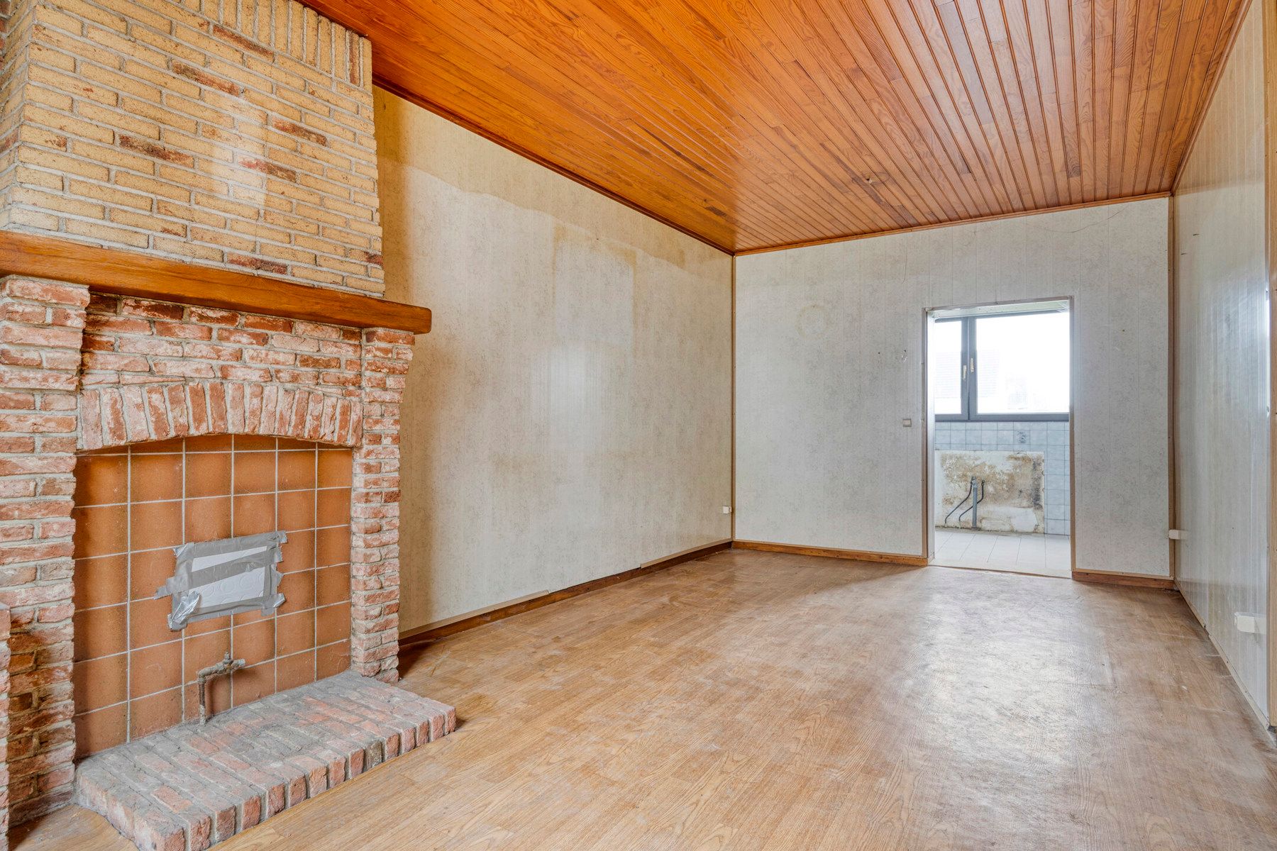 Te renoveren woning (3 slpk) met tuin. foto 4