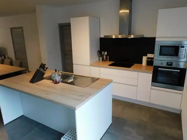 Rustig gelegen, energiezuinig appartement met carport foto 5