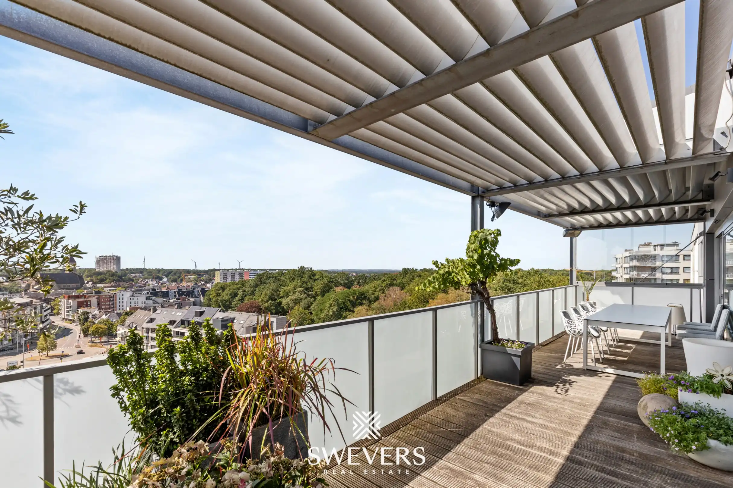 Exclusief penthouse met veel lichtinval en ruim panoramisch terras met prachtig ver uitzicht in centrum Genk foto 28