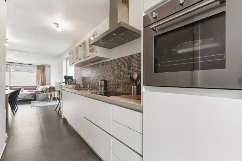 Recente halfopen woning met garage  te Heule foto 6