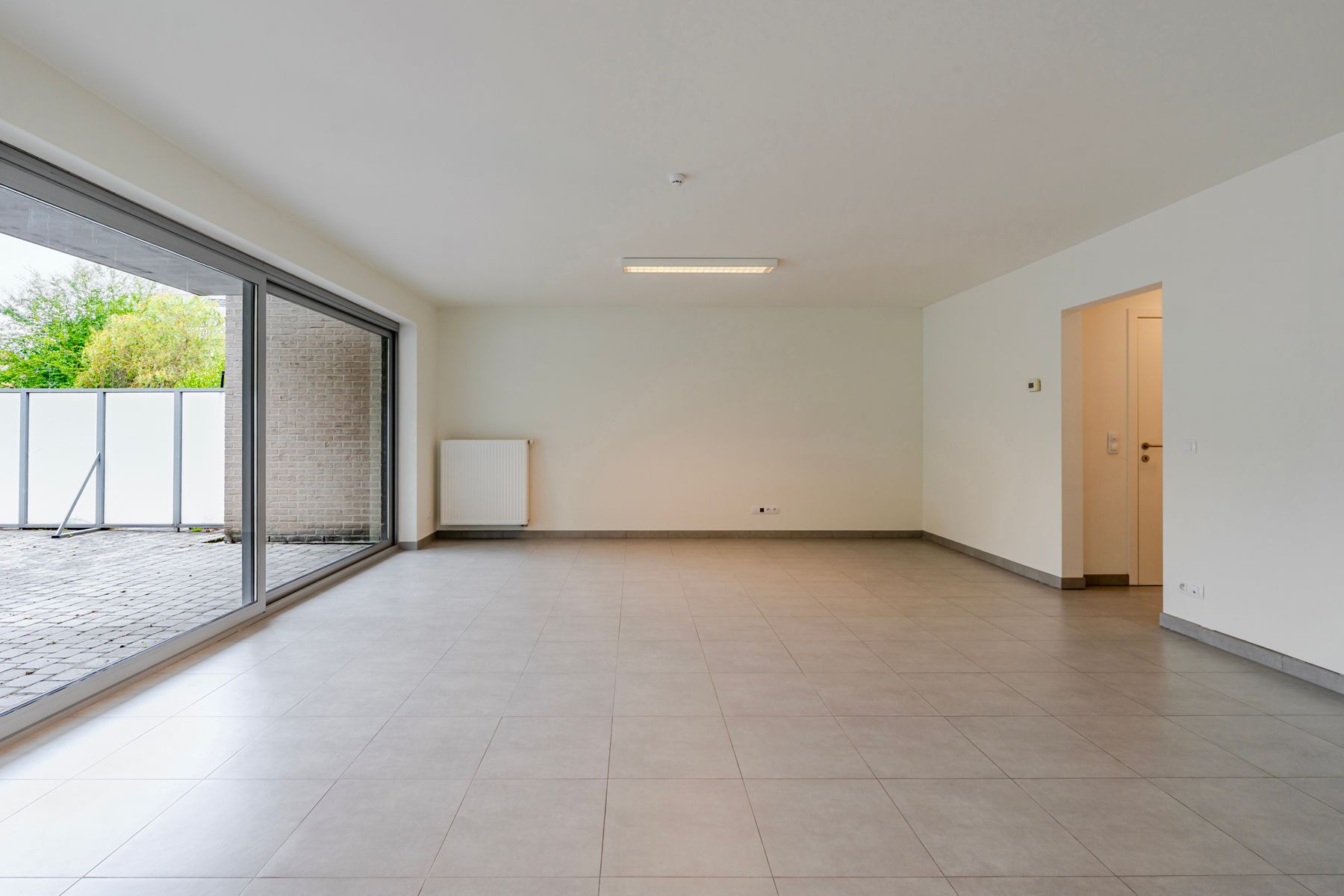 Instapklaar 2 slaapkamer appartement met grote tuin foto 5