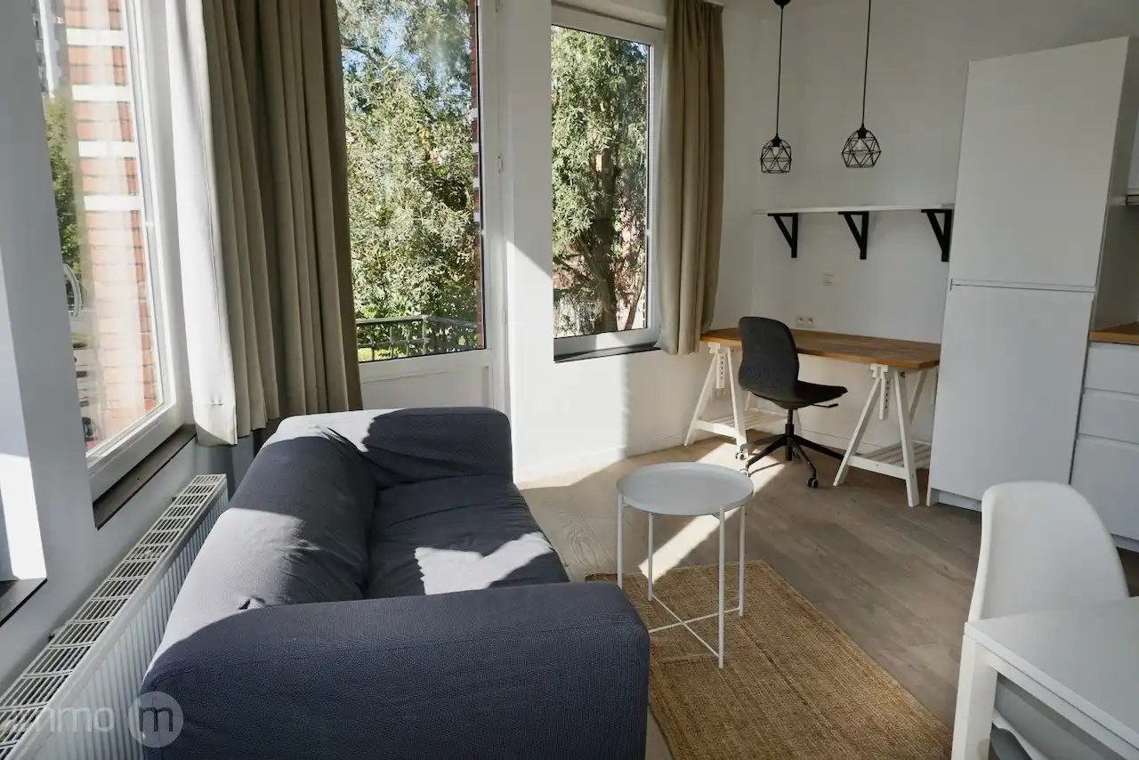 Gemeubelde studio 32m2 met aparte slaapkamer en open uitzicht – Tervuursevest Leuven foto 5