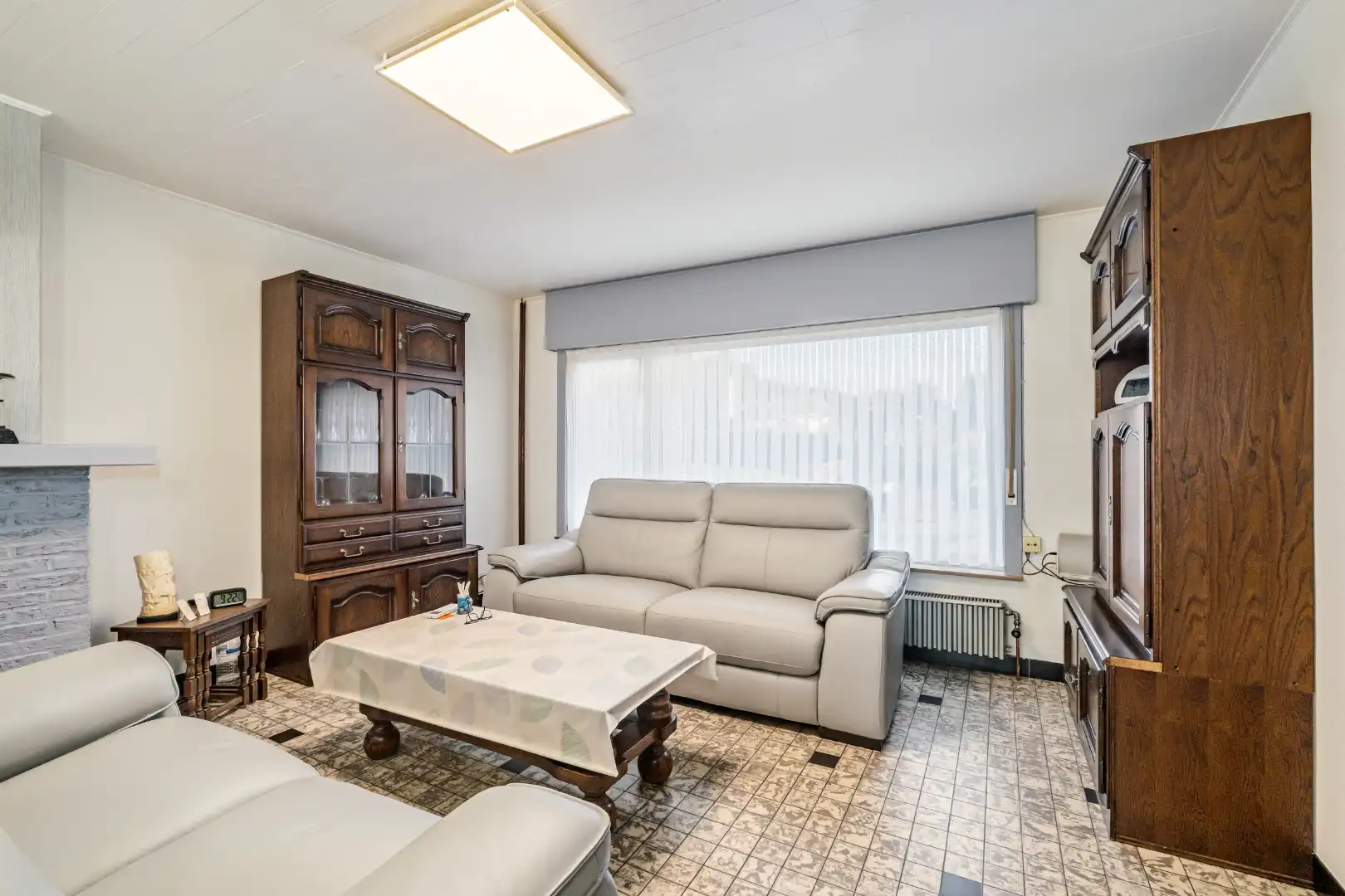 Gezellige en lichtrijke woning met 2 slaapkamers en ruime tuin foto 3