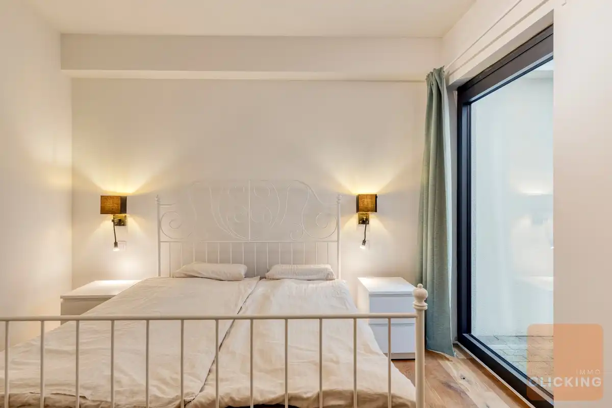 Stijlvol en recent appartement met tuin en patio foto 20