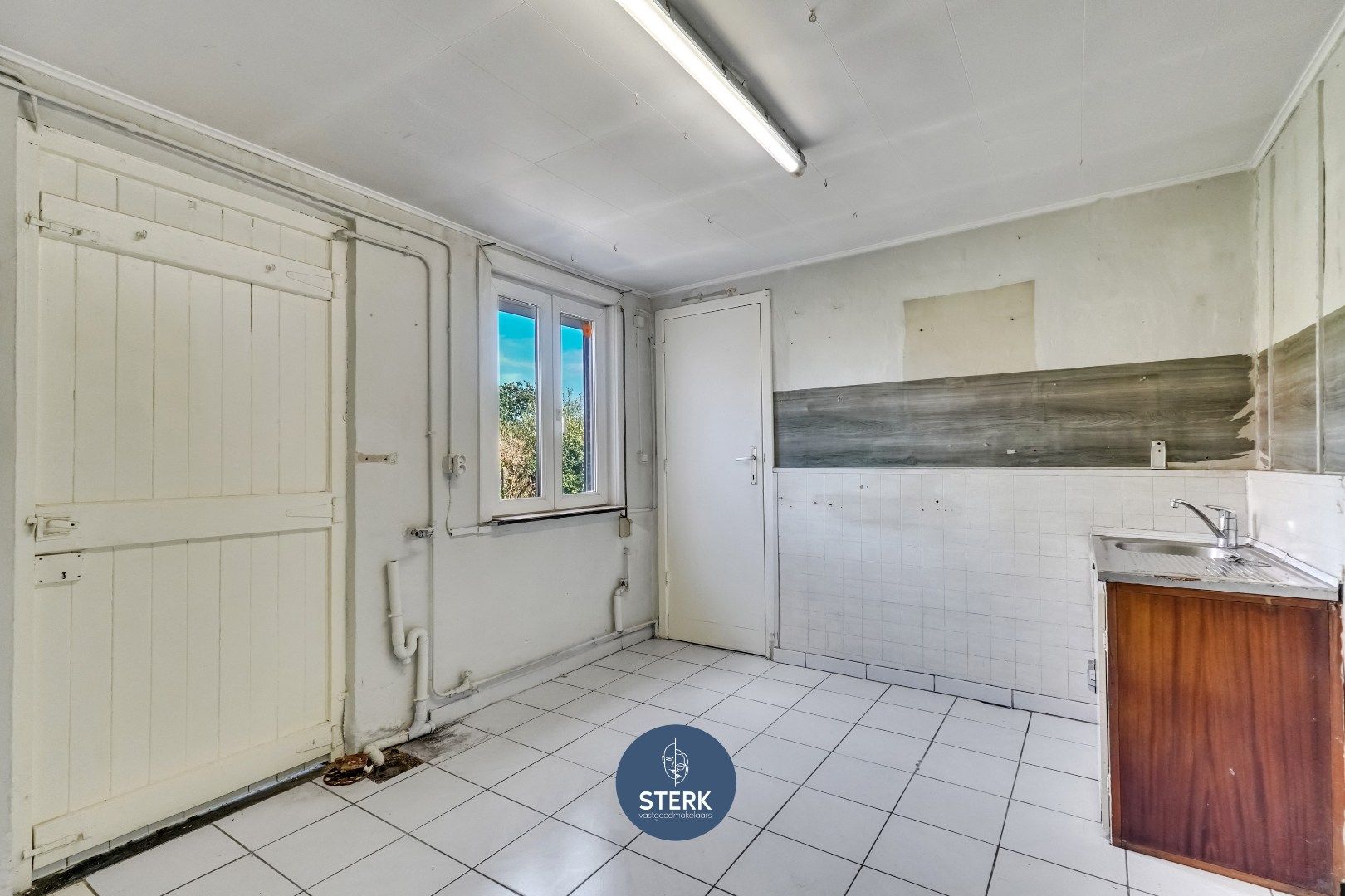 TE VERNIEUWEN WONING OP EEN PERCEEL VAN CIRCA 19 ARE TE LANAKEN !  foto 11