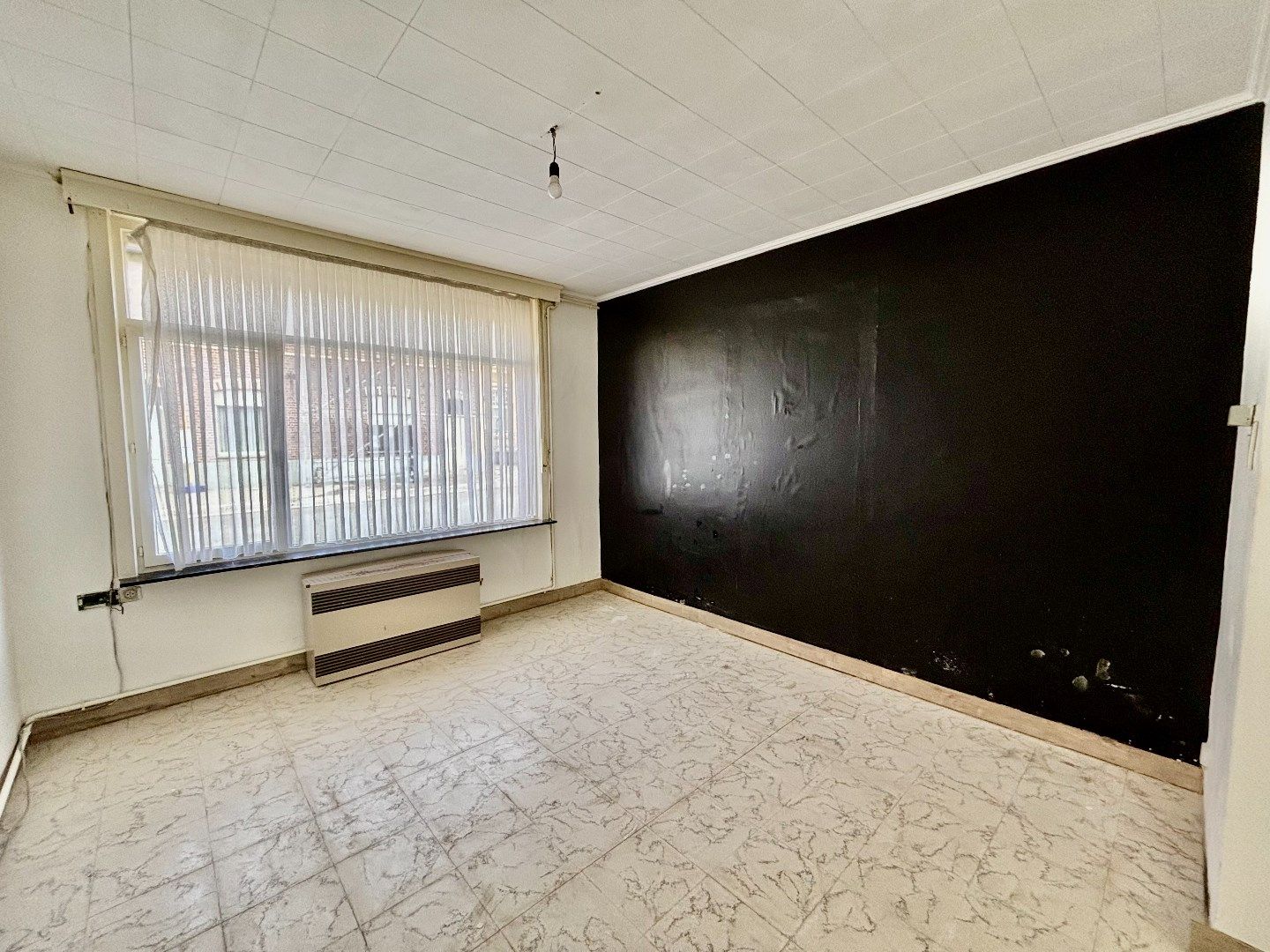 Ruime karaktervolle woning centrum Boezinge. foto 11