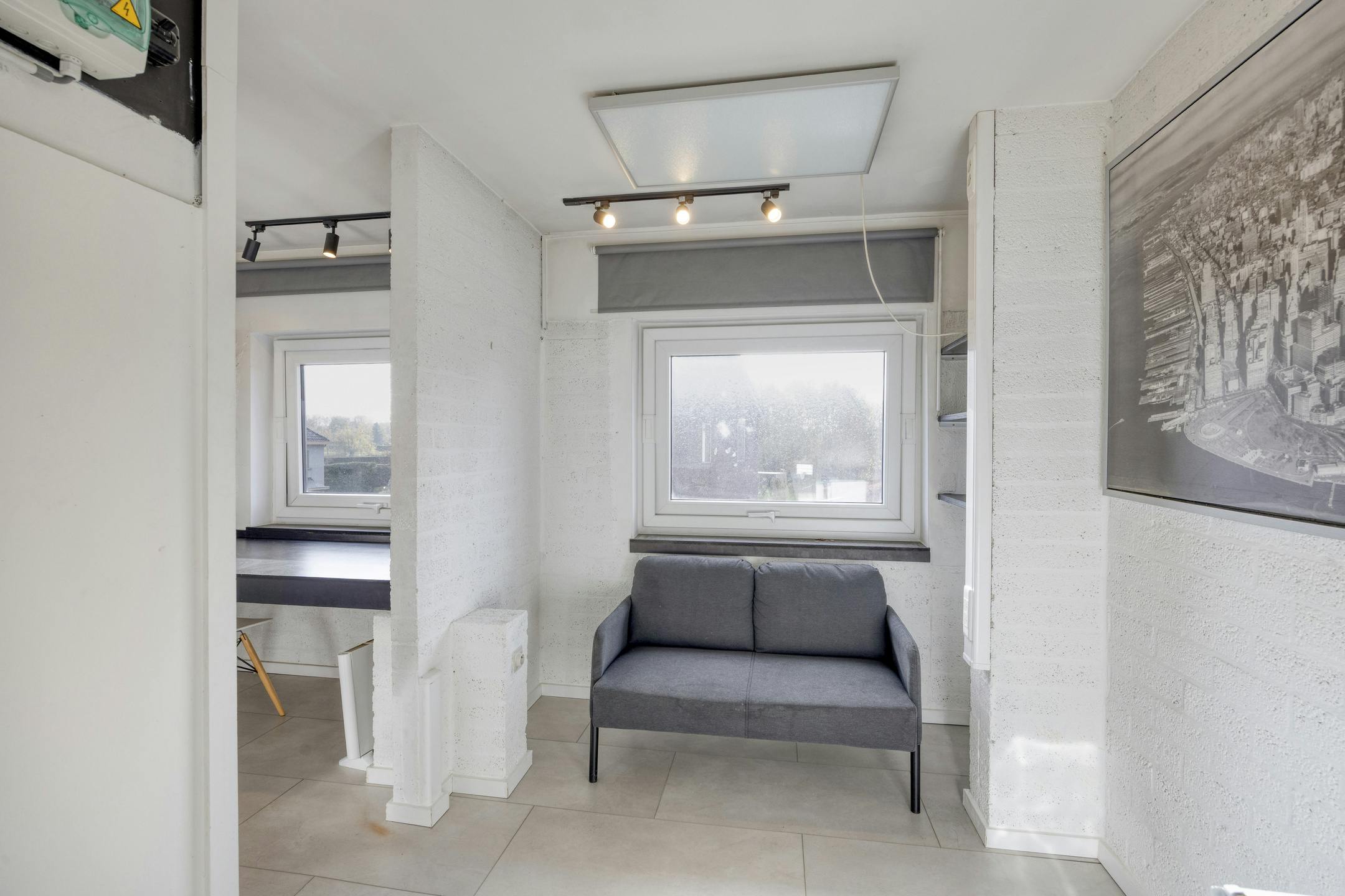 Opbrengsteigendom met 9 studentenkamers en duplex-appartement te Hasselt foto 12