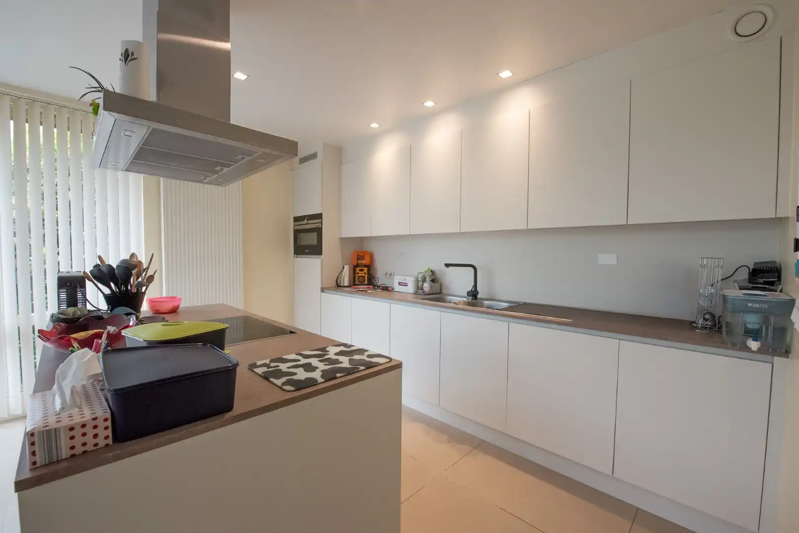 Charmante, halfopen bebouwing op 978 m² te koop in Zulte! foto 2