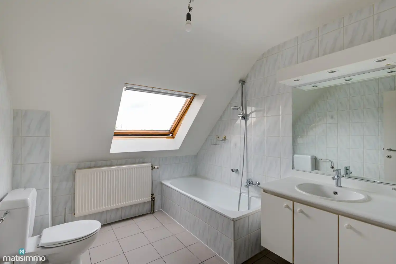 INSTAPKLAAR DUPLEXAPPARTEMENT MET 2 SLAAPKAMERS EN GARAGE NABIJ HET CENTRUM VAN BILZEN foto 10