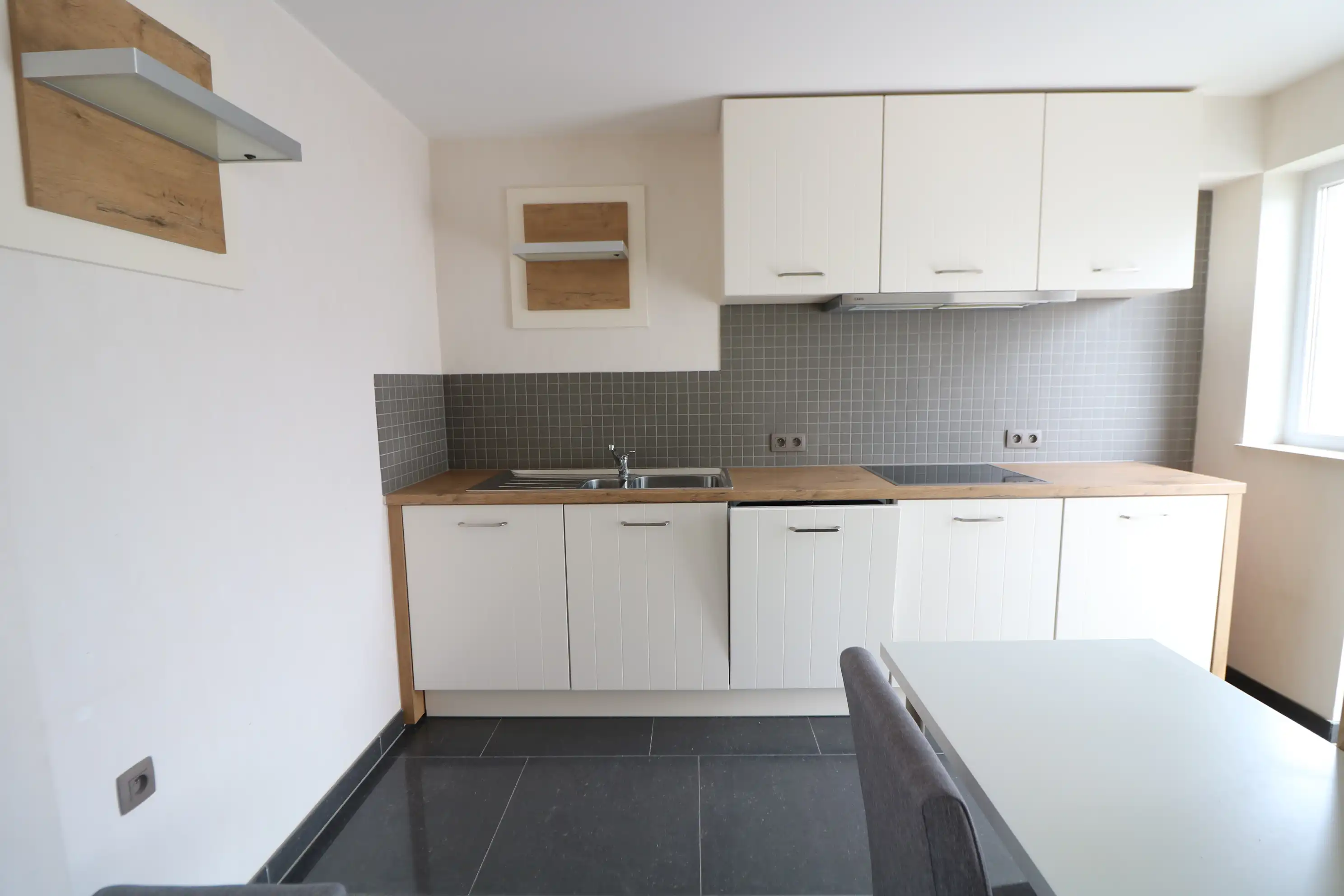 Ruim en lichtrijk hoekappartement met 2 slaapkamers, terras én garage foto 9