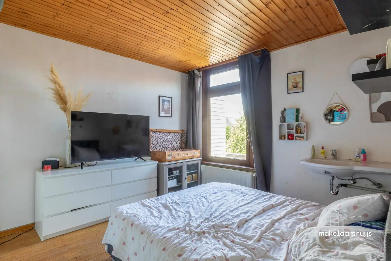 Ruime woning met 4 slpk en aangename tuin te Sint-Amandsberg foto 10